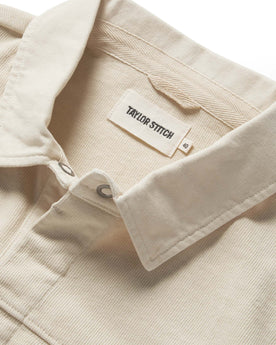 material shot of the collar on The Turnover Shirt in Washed Natural, Knits by Taylor Stitch