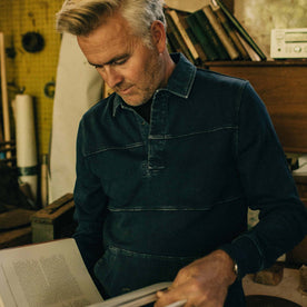 fit model reading in The Turnover Shirt in Washed Indigo
