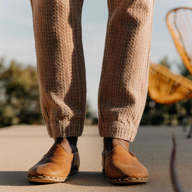 fit model putting his hand in the pocket of The Apres Pant in Baja Stripe