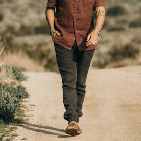 fit model walking in the desert in The Apres Pant in Shadow Hemp