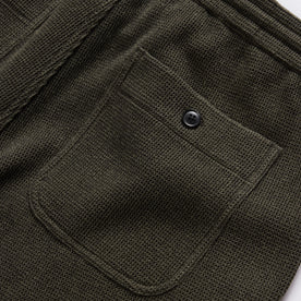 material shot of the rear pocket on The Apres Short in Army Waffle