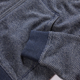 material shot of the ribbed cuffs on The Apres Zip Hoodie in Heather Navy Terry
