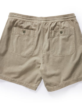 flatlay of The Apres Short in Arid Eucalyptus Micro Cord, shown from back, Bottoms by Taylor Stitch