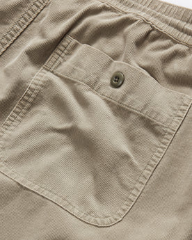 material shot of the rear pocket on The Apres Short in Arid Eucalyptus Micro Cord, Bottoms by Taylor Stitch