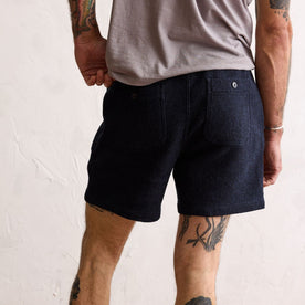 fit model showing the back of The Apres Short in Indigo Waffle