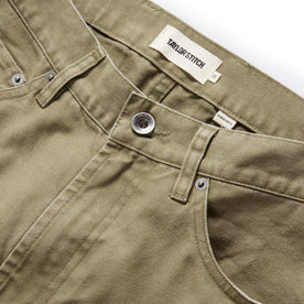 material shot of the button fly on The Democratic All Day Pant in Arid Eucalyptus Canvas