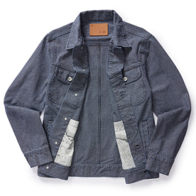 flatlay of The Long Haul Jacket in Washed Indigo Stripe, shown open