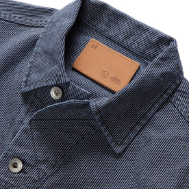 material shot of the collar on The Long Haul Jacket in Washed Indigo Stripe