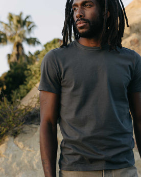 fit model in The Organic Cotton Tee in Faded Black, Knits by Taylor Stitch
