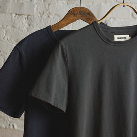 material shot of the sleeve on The Organic Cotton Tee in Faded Black