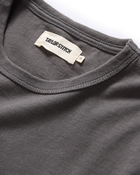 material shot of the neck opening on The Organic Cotton Tee in Faded Black, Knits by Taylor Stitch