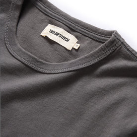 material shot of the neck opening on The Organic Cotton Tee in Faded Black