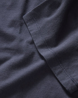 material shot of the sleeve on The Organic Cotton Tee in Navy, Knits by Taylor Stitch