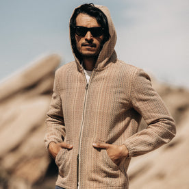 fit model with the hood up in The Riptide Jacket in Baja Stripe