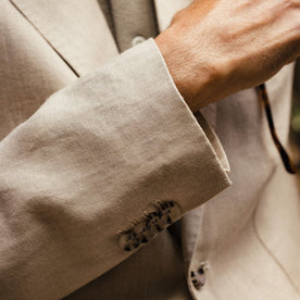 fit model showing the light horn sleeve buttons on The Sheffield Sport Coat in Natural Linen