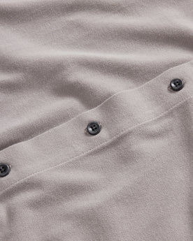 material shot of the burnt corozo buttons on The Short Sleeve California in Steeple Grey Pique, Knits by Taylor Stitch