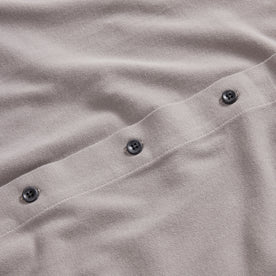 material shot of the burnt corozo buttons on The Short Sleeve California in Steeple Grey Pique