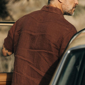 fit model showing the back yoke of The Short Sleeve Western in Dried Guajillo