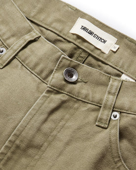 material shot of the button fly on The Slim All Day Pant in Arid Eucalyptus Canvas, Bottoms by Taylor Stitch
