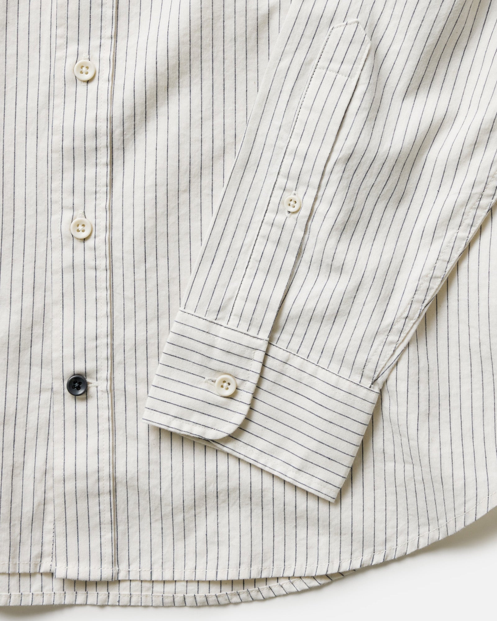 material shot of the back collar button on The Jack in Indigo Stripe, Wovens by Taylor Stitch
