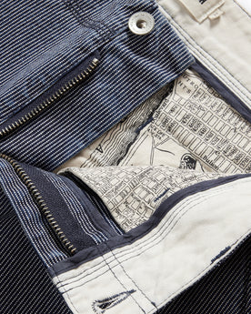 material shot of the zip fly undone on The Morse Pant in Washed Indigo Stripe, Bottoms by Taylor Stitch