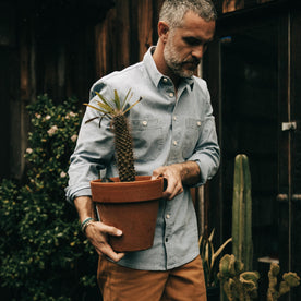 fit model walking in The Utility Shirt in Washed Indigo Boss Duck