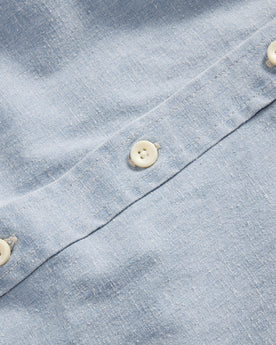 material shot of the buttons on The Utility Shirt in Washed Indigo Boss Duck, Wovens by Taylor Stitch