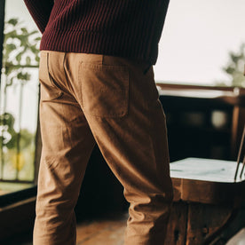 fit model wearing The Camp Pant in Tobacco Boss Duck, back, Bottoms by Taylor Stitch