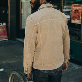 fit model wearing The Dispatch Jacket in Khaki Cord, back shot