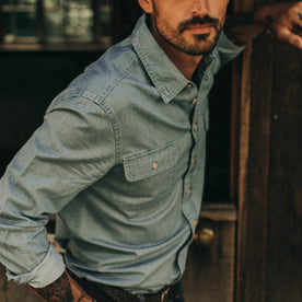 fit model wearing The Ledge Shirt in Sun Bleached Chambray, up close of sleeve