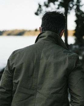 fit model from the back wearing The Lined Watts Jacket in Olive, Outerwear by Taylor Stitch