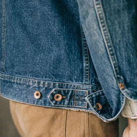 fit model wearing The Long Haul Jacket in 18 Month Wash Organic Selvage, button details
