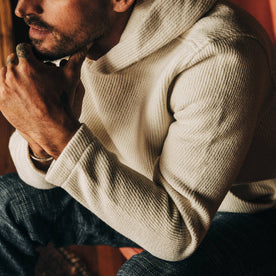 fit model wearing The Nomad Hoodie in Natural Twill, sleeve shot