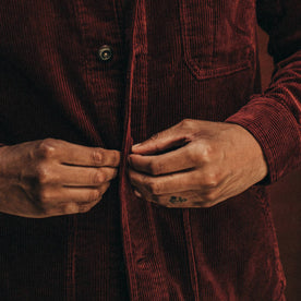 fit model wearing The Ojai Jacket in Burgundy Cord, buttoning jacket