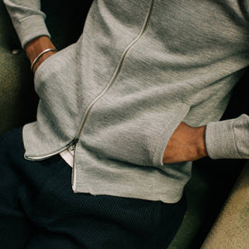 fit model wearing portola hoodie, hands in pockets