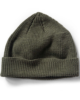 flatlay of The Rib Beanie in Forest Heather, Accessories by Taylor Stitch