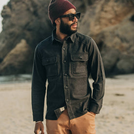 fit model wearing The Shop Shirt in Coal Boss Duck, looking right