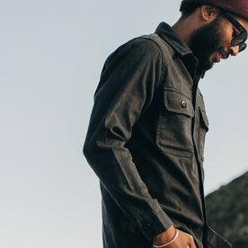 fit model wearing The Shop Shirt in Coal Boss Duck, walking right