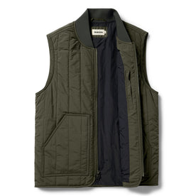 flatlay of The Able Vest in Quilted Army, shown zipped open