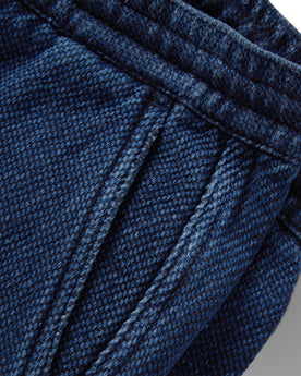 material shot of the pocket on The Apres Pant in Indigo Cross Dye, Bottoms by Taylor Stitch