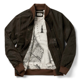 flatlay of The Bomber Jacket in Bark EverWax, shown open