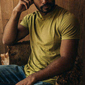 fit model sitting in The Cotton Hemp Tee in Juniper