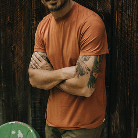 fit model standing in The Cotton Hemp Tee in Copper