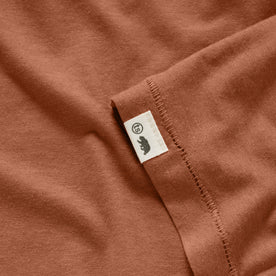material shot of the TS tag on The Cotton Hemp Tee in Copper