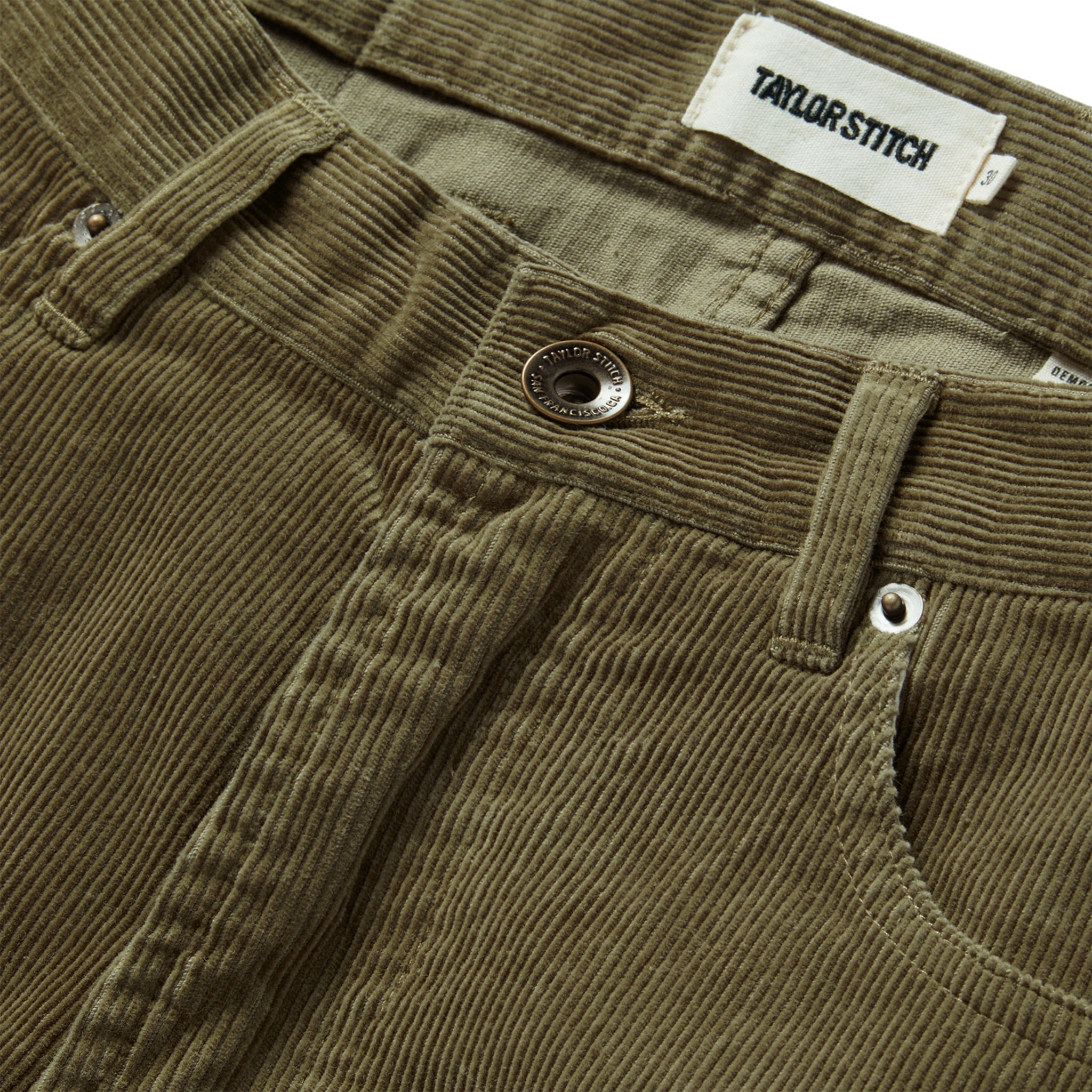 material shot of the button fly on The Democratic All Day Pant in Cypress Cord, Bottoms by Taylor Stitch
