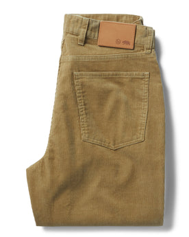 flatlay of The Democratic All Day Pant in Khaki Cord, shown folded from the back, Bottoms by Taylor Stitch