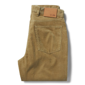 flatlay of The Democratic All Day Pant in Khaki Cord, shown folded from the back