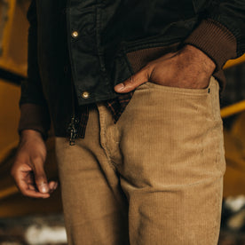 fit model standing in The Democratic All Day Pant in Khaki Cord