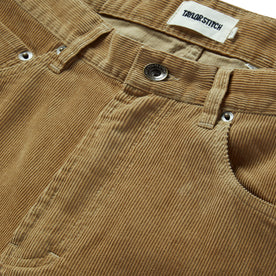 material shot of the button fly of The Democratic All Day Pant in Khaki Cord