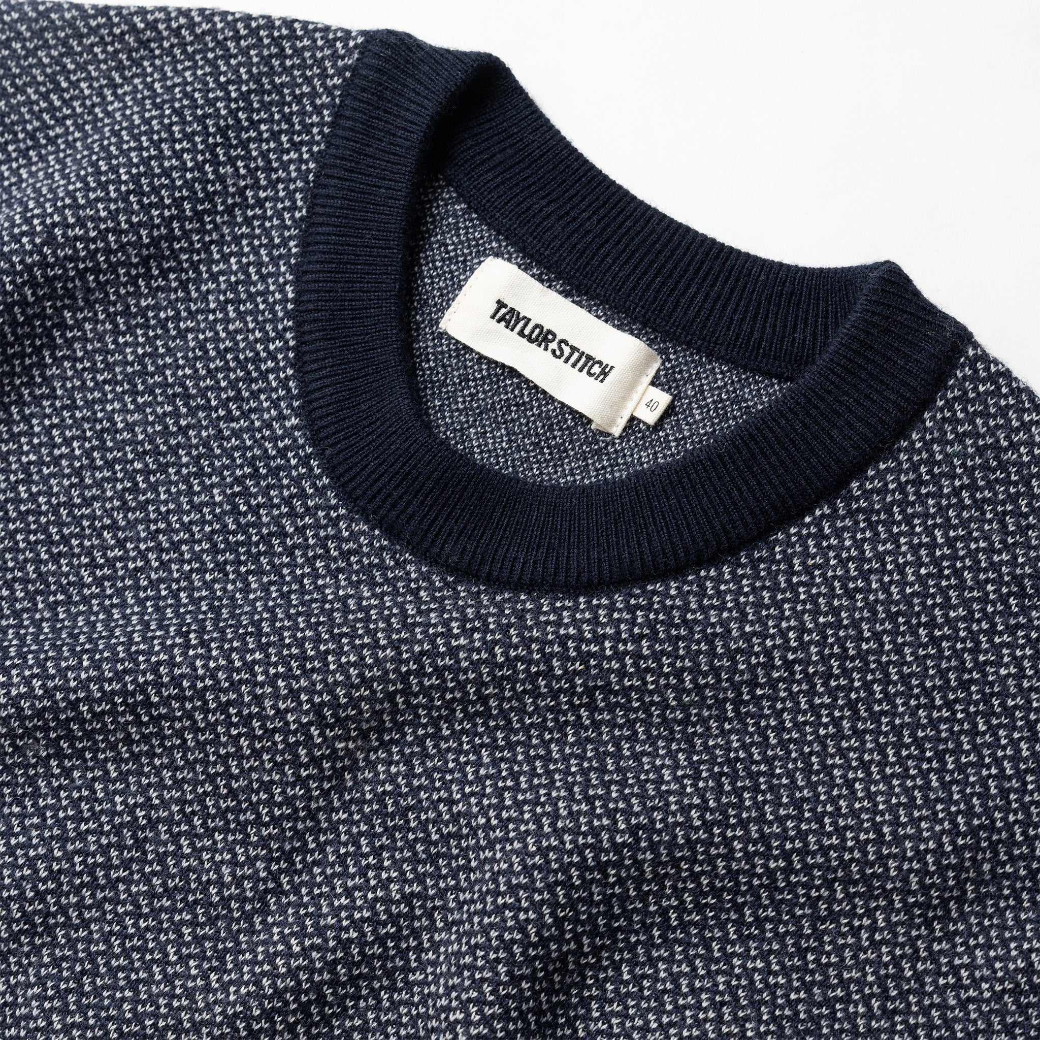 material shot of the collar on The Everett Sweater in Navy Birdseye, Knits by Taylor Stitch